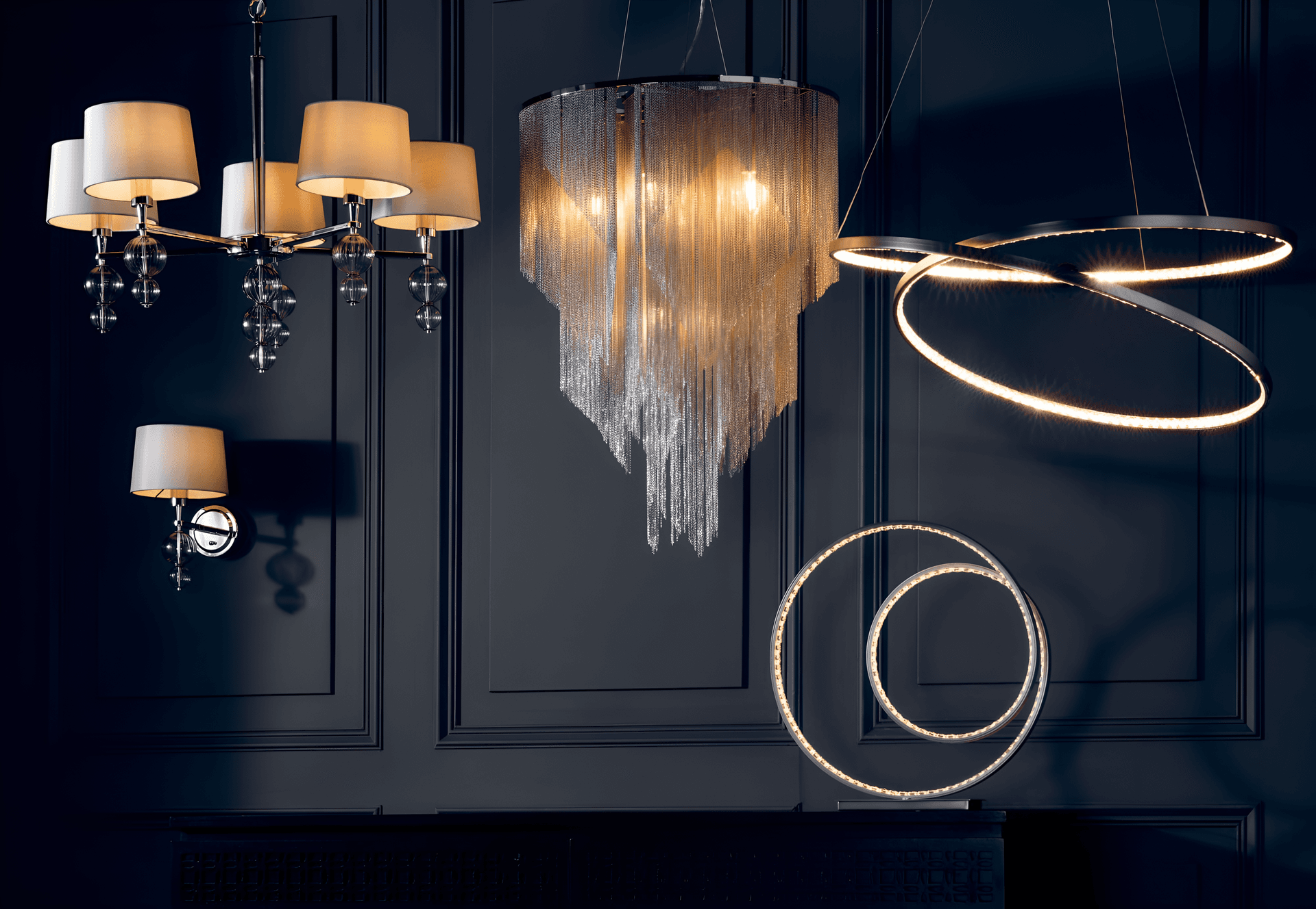 Multi-arm crystal chandelier suspended above a furnished reception or dining space