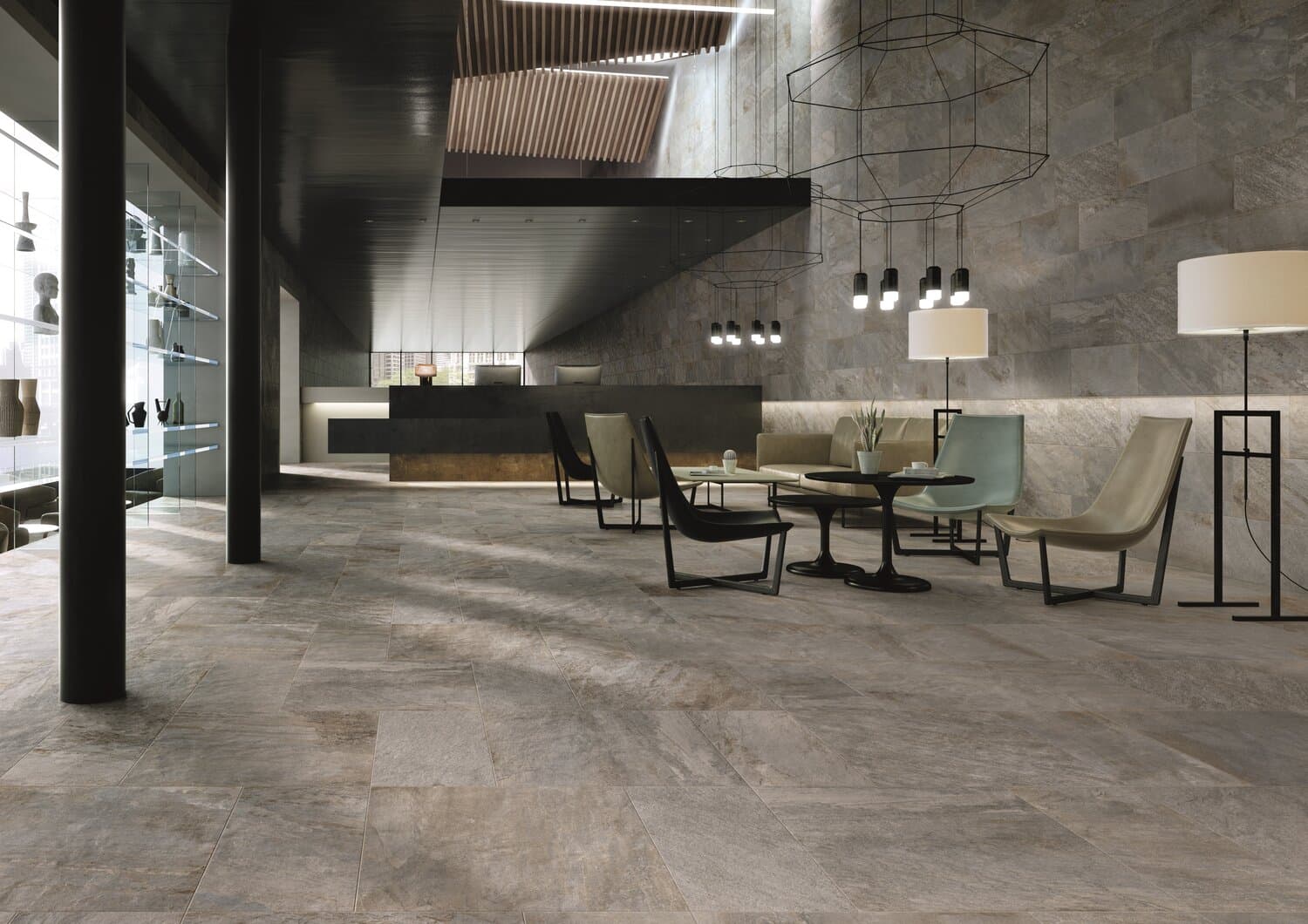 Large-format porcelain floor tiles laid in a contemporary interior room