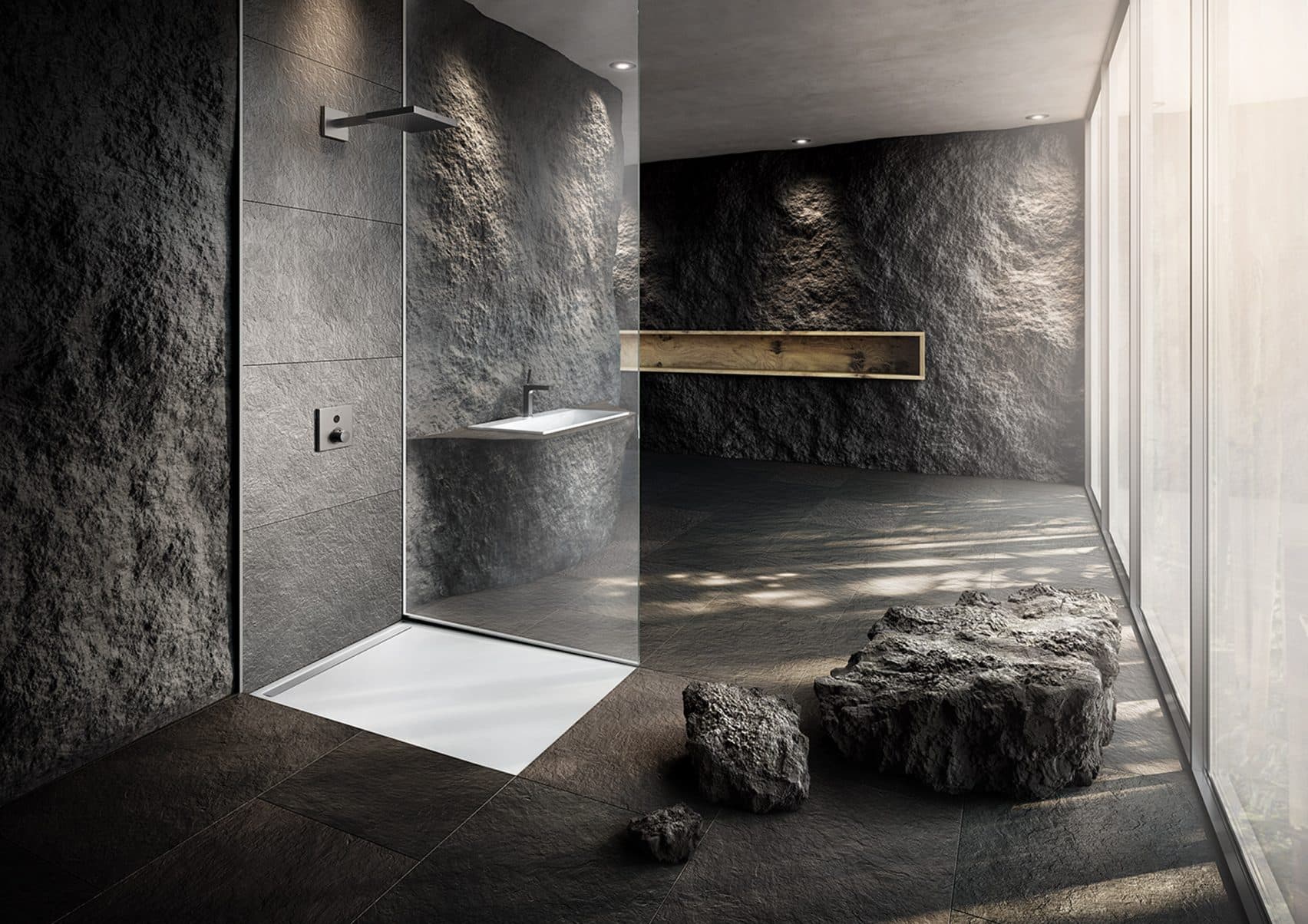 Glass-enclosed shower cubicle with overhead rain showerhead and tiled surround